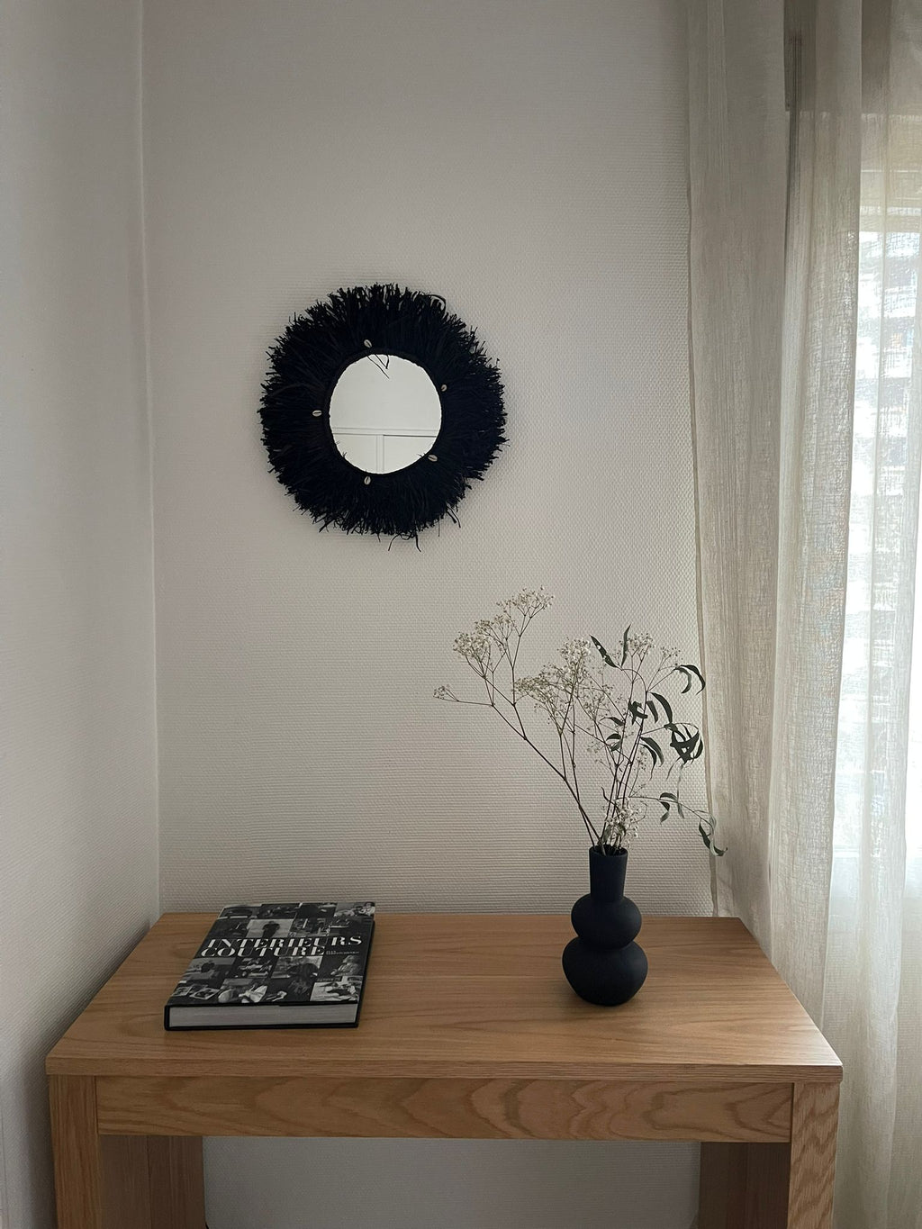 Miroir soleil en raphia noir Madagascar