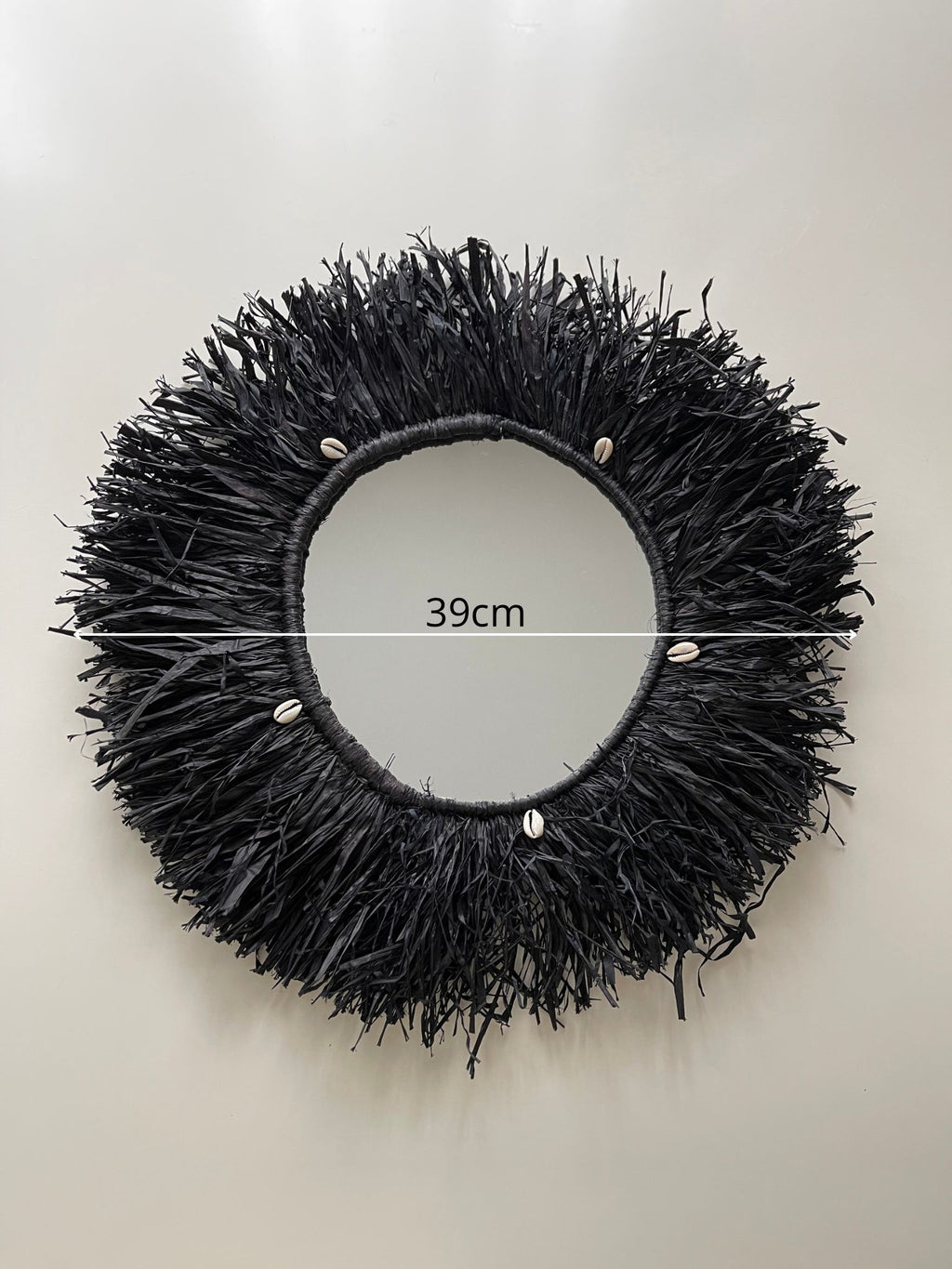 Miroir soleil en raphia noir Madagascar